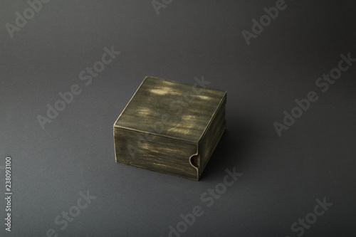 Fototapeta Naklejka Na Ścianę i Meble -  Wooden box, gift wrap, on a dark background