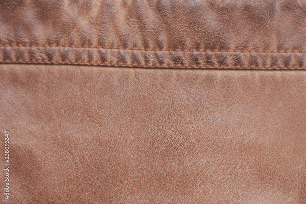 Brown background of leather texture stitched stitch. Old, worn Brown background of leather texture stitched stitch. Old, worn
