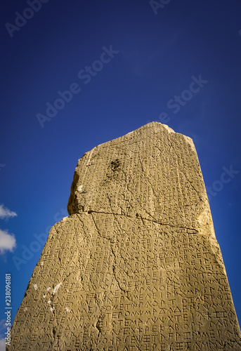 Xanthos Ancient city, inscribed grave monument and the ruin of ancient city of Xanthos - Letoon  (Xantos, Xhantos, Xanths) in Kas, Antalya/Turkey. Language of Arnna/Lycia. photo