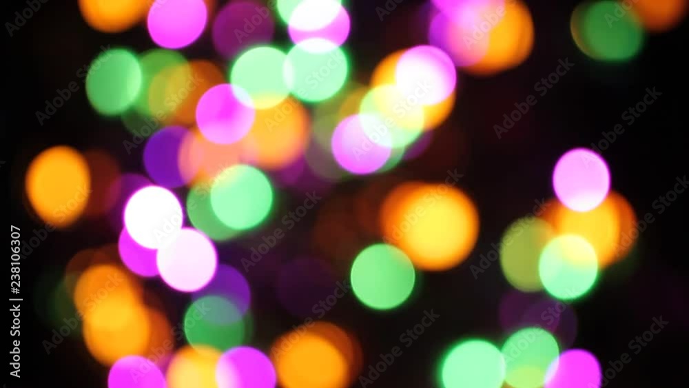 Illuminated New Year garland and house on pine-tree. Closeup Illuminated New Year garland and house on pine-tree. Closeup
