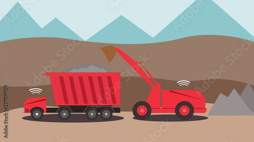 Autonomous excavator and truck working in a stone quarry