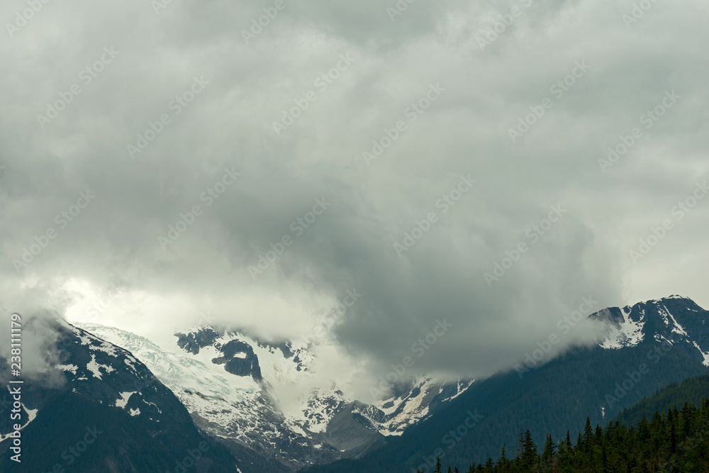 Storm clouds above the glacier on Oscar Peak in British Columbia, Canada