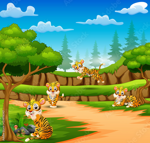 Fototapeta Naklejka Na Ścianę i Meble -  Tiger cartoon are enjoying nature in the forest