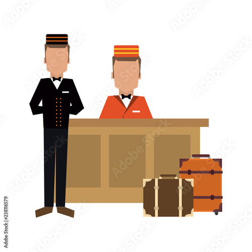 Bellboy with luggage at reception