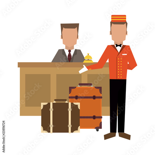 Bellboy with luggage at reception