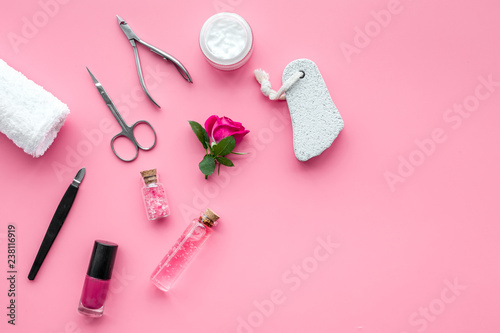 manicure and pedicure equipment for nail bar set on rose background top view mockup