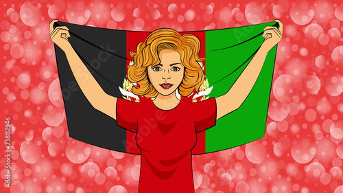 blonde girl holding a national flag of Afghanistan photo