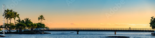 Sunrise Silhouette of the foot bridge at Hilo Bay, Hawaii's Big Island