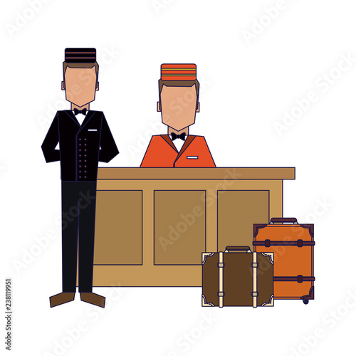 Bellboy with luggage at reception