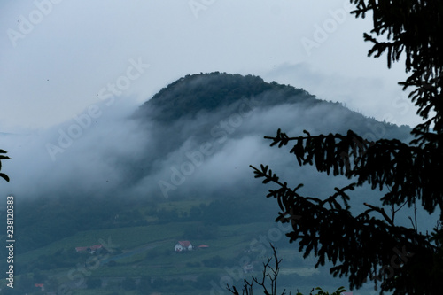Morning mist over hill