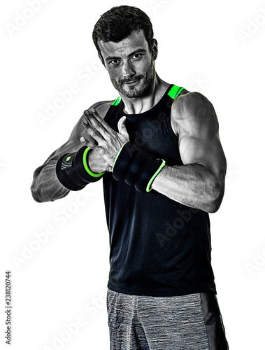 one caucasian fitness man exercising cardio boxing exercises in studio  isolated on white background photo