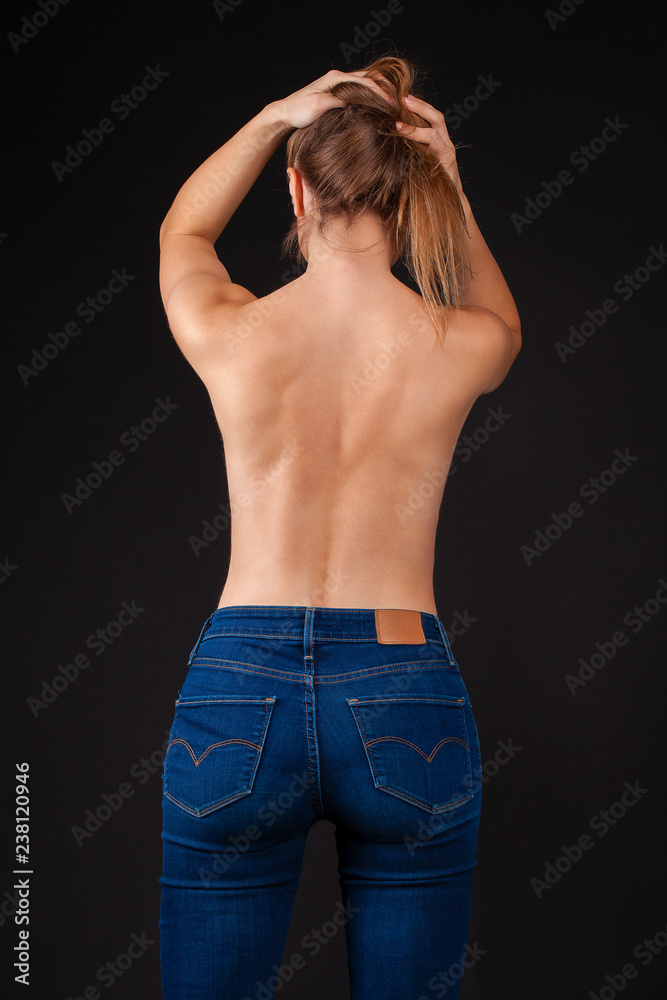 Back view, sexy young woman in denim jeans Stock Photo | Adobe Stock