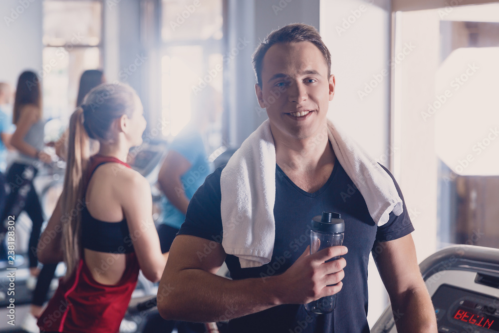 A man rejoices with his result on the treadmill A man rejoices with his result on the treadmill