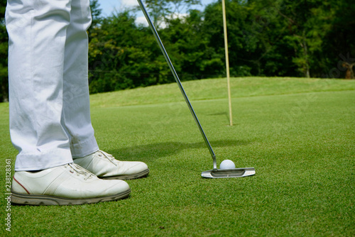 Golfer playing golf in beautiful golf course in the evening golf course with sunshine in thailand