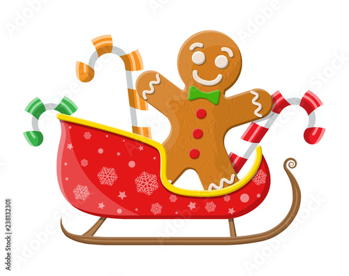 Gingerbread man cookie candycane in santa sleigh