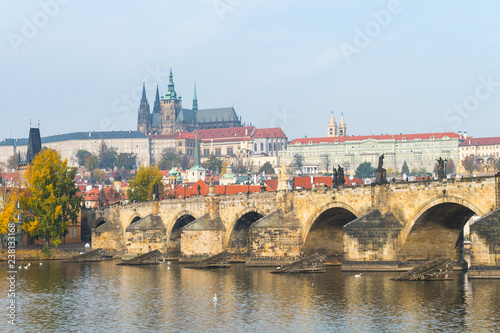 prague river bank and old town at background, czech republic