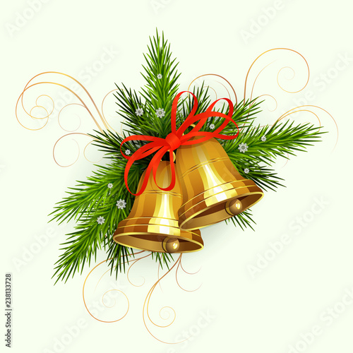 Christmas arrangement of spruce green branches with white snowflakes, two golden bells with a red ribbon
