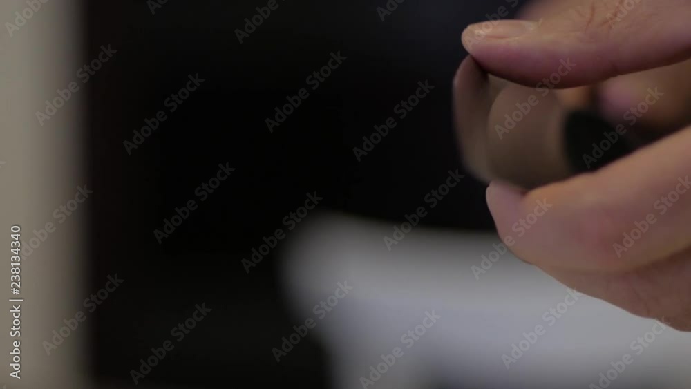 Man touches a sharp knife