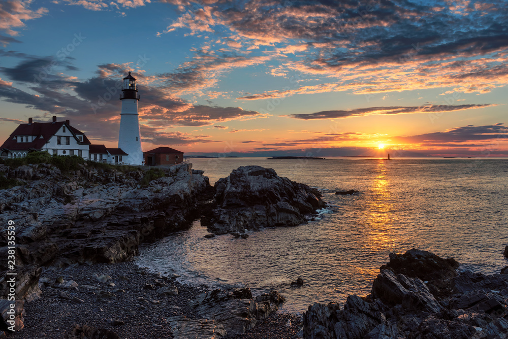 Portland Lighthouse at sunrise in Cape Elizabeth, New England, Maine, USA.   