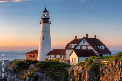 Portland Lighthouse at sunrise in Cape Elizabeth,  Maine, USA.    photo