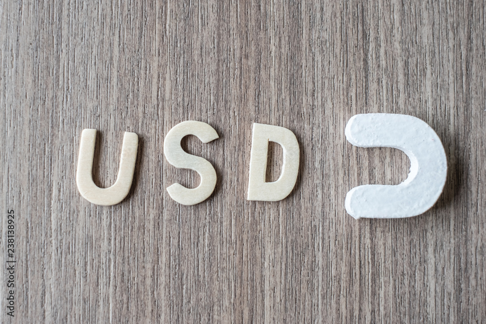 USD word of wooden alphabet letters with Magnetic. Business, Finance and Idea concept USD word of wooden alphabet letters with Magnetic. Business, Finance and Idea concept