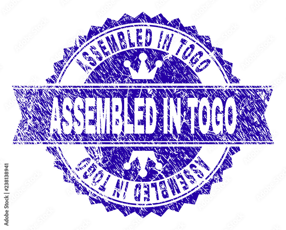 Obraz premium ASSEMBLED IN TOGO rosette stamp imitation with grunge style. Designed with round rosette, ribbon and small crowns. Blue vector rubber print of ASSEMBLED IN TOGO caption with grunge style.