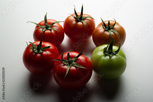 Evolution of red tomato isolated on white background