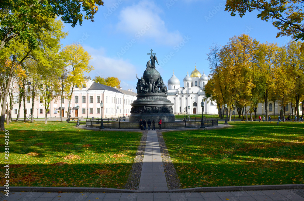 Monument the Millennium of Russia, St. Sophia Cathedral, Kremlin in Veliky Novgorod, Russia. Autumn landscape, people in the park.