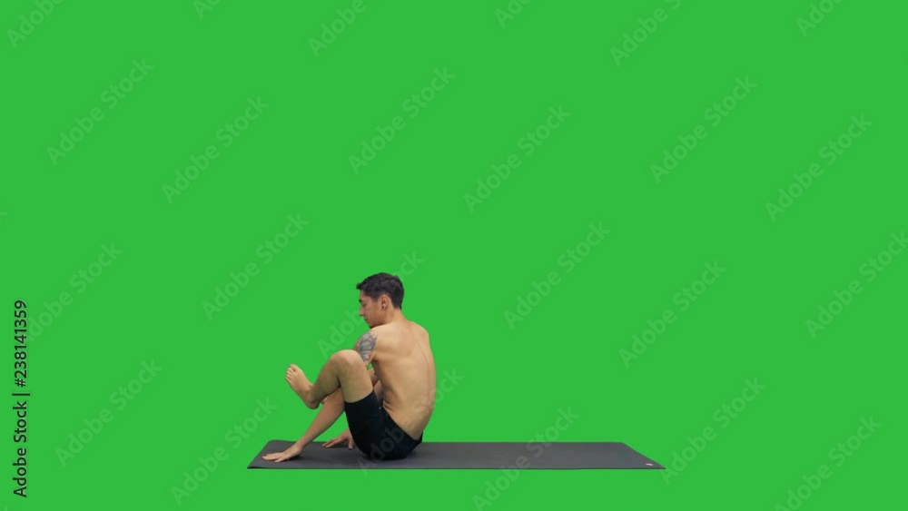 Yoga Dwi Pada Sirsasana feet behind the head pose on a Green Screen