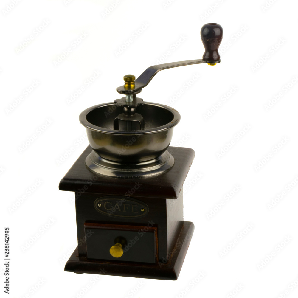 manual coffee grinder with a wooden case on a white background manual coffee grinder with a wooden case on a white background