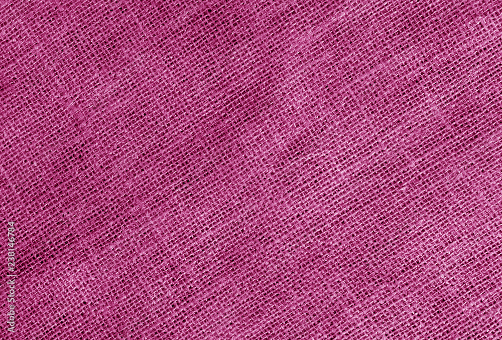 Fototapeta premium Linen cloth texture in pink color.