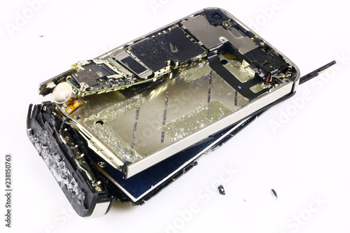 shattered, broken smartphone on white background