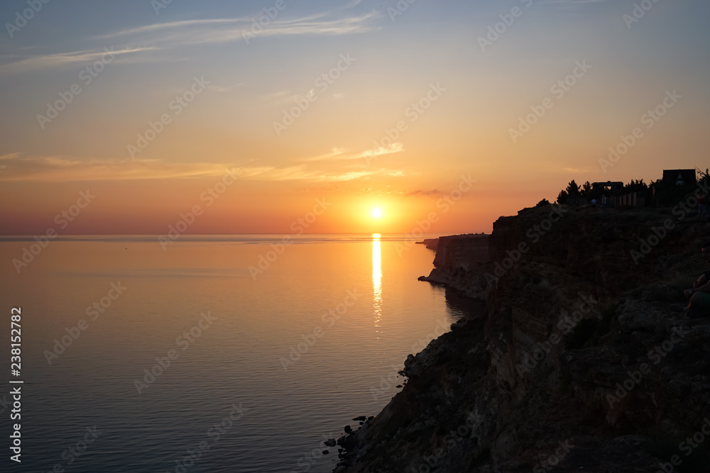 Amazing sunset over the sea and coastline.