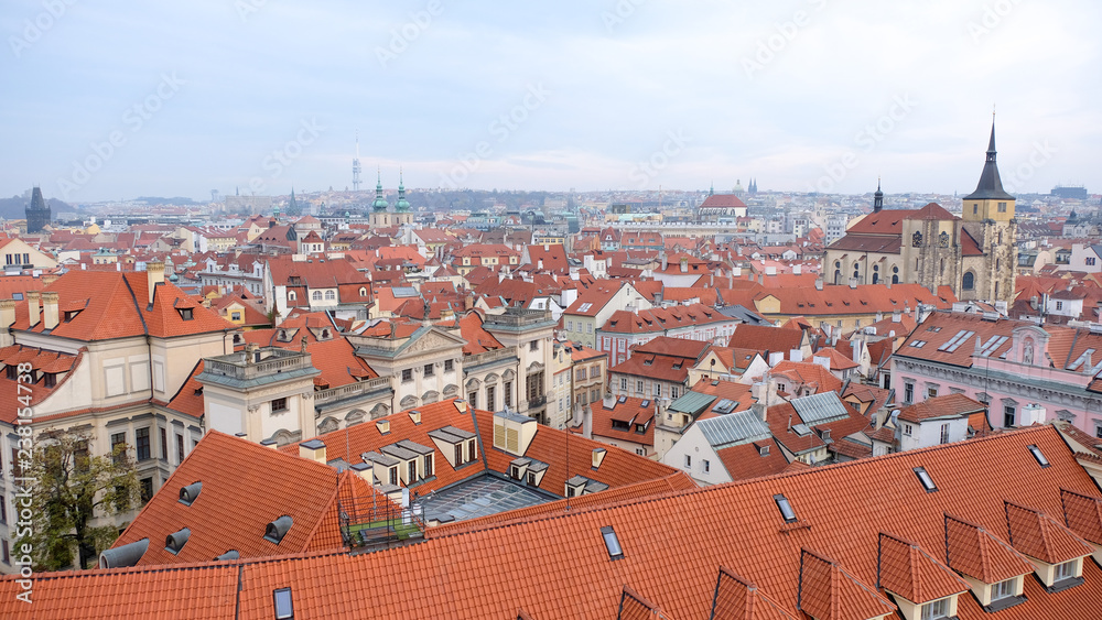 Obraz premium top view of the Prague city from astronomical tower. Layers of red roof building, Czech republic