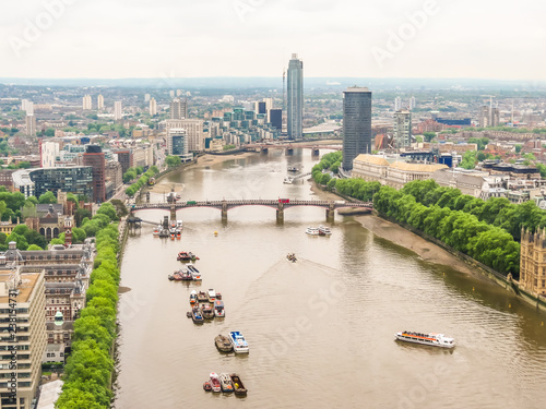 London bridges through the Thames River photo
