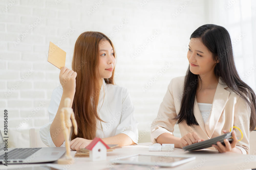 Real estate problem with realtor, lawyer or architect, clients having claim about house construction.business meeting choose the design for built.