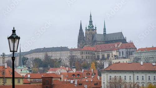 Prague Castle view from old town side in misty autumn season, Czech Republic