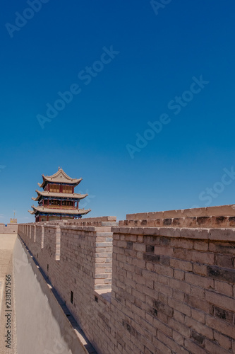Gate tower building and walls under blue sky at Jiayu Pass  in Jiayuguan  China