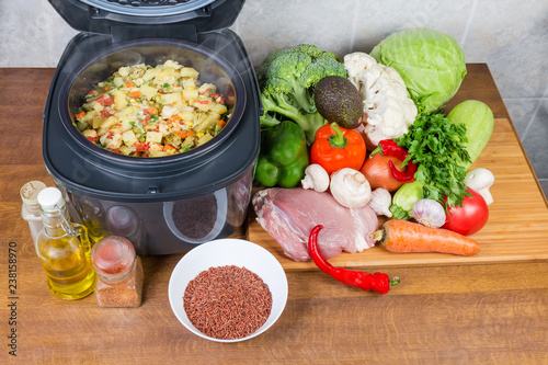 Vegetables braised in household multi-cooker among of raw foods