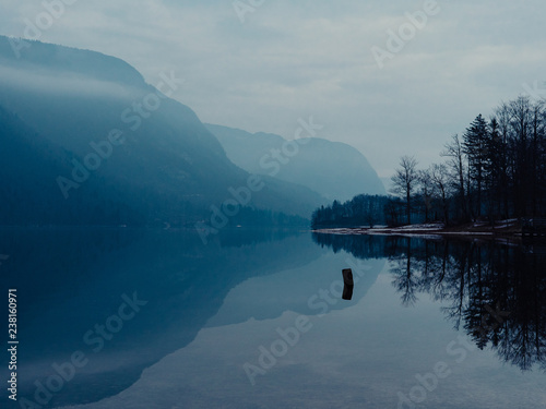 Amazing landscape. Lake and mountain. Reflection on the lake. Artstic colours. photo