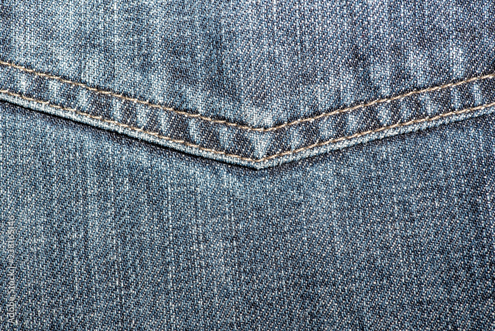 Blue jeans fabric for fashion design. Close-up jeans texture. Blue jeans fabric for fashion design. Close-up jeans texture.