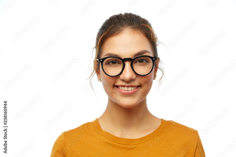 education, vision and people concept - smiling student girl in glasses over white background