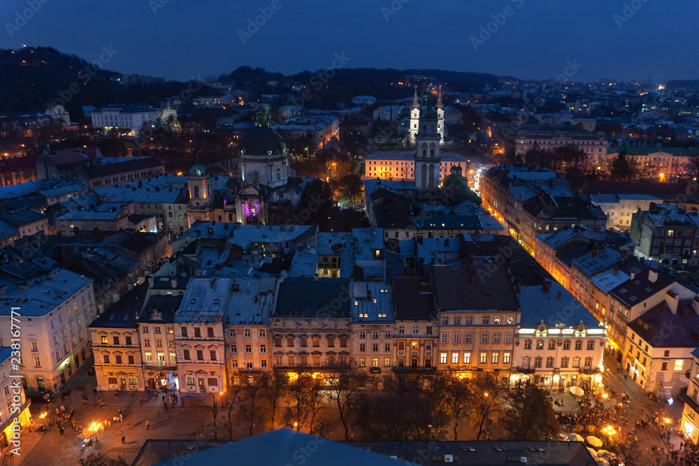 Panoramic night cityscape  view on roofs , center and domes of Lviv city, Ukraine
