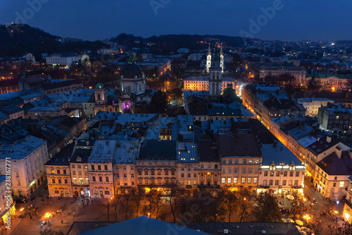 Fototapeta Naklejka Na Ścianę i Meble -  Panoramic night cityscape  view on roofs , center and domes of Lviv city, Ukraine