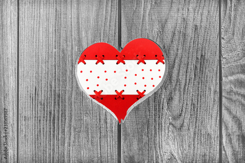 colorful heart on wooden background