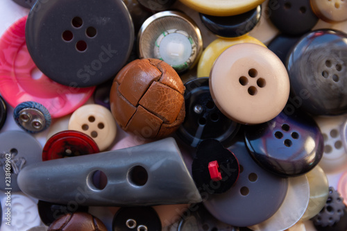 Pile of assorted used buttons