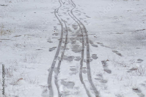 human footprints and sleet traces from the sleigh