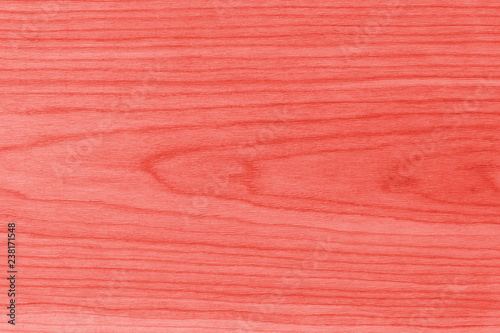 Background, the structure of a wooden kitchen board (brashing), macro, top view - living coral