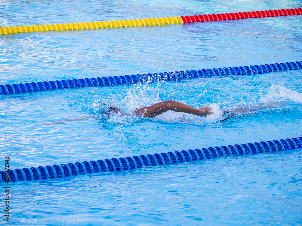 Young man in the swimming.