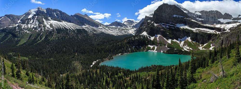 Summertime panorama of Grinnell lake in Glacier NP, Montana 
